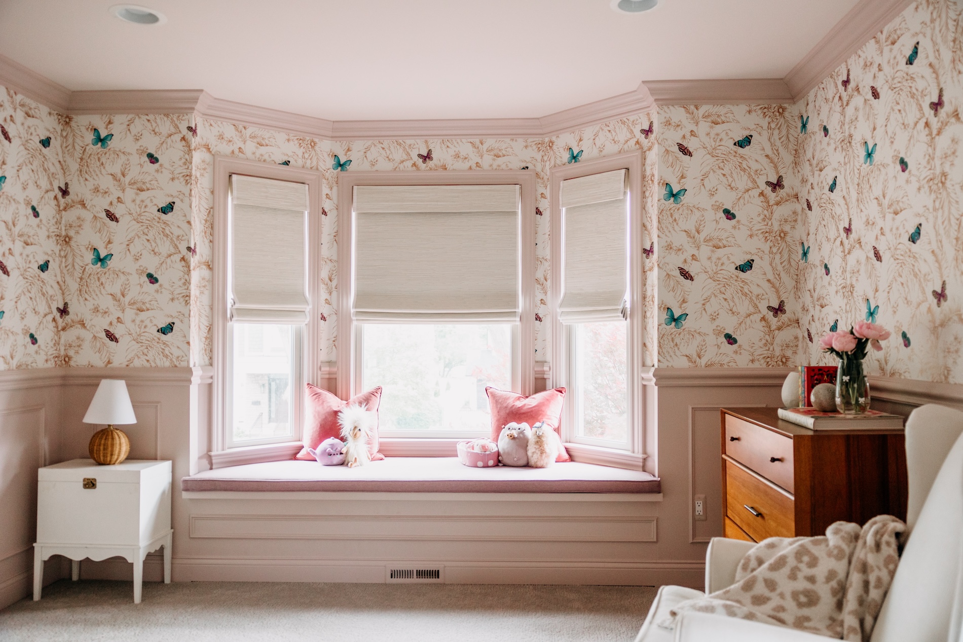 pink bedroom interior design with window seat